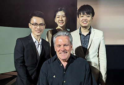 Allen with students
